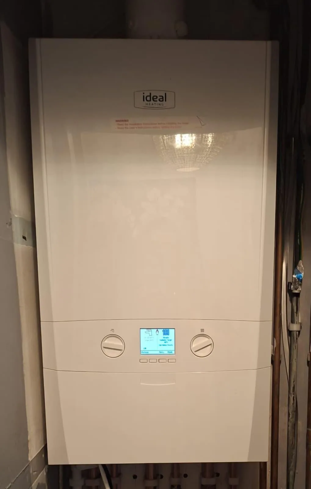 New Ideal combi boiler commissioned and running with the digital display on
